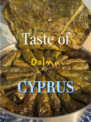 Cooking dolma with my mum! This is taste of Cyprus   Today we are cooking Dolma - vine leaves stuffed with spiced rice  Recipe:  50 vine leafs  For the filling  250g rice - short grain  5g fresh mint  10g parsely  20g tomato paste  200g grated tomatoes  10g pomegranate molasses 2 onions  100ml olive oil salt & pepper  method: first wash the rice well, once the water is clear allow the rice to soak for 20-30 mins, then prepare the vine leafs by triming the stalk. finely chop the onion herbs mix everything together season well & add around 20g stuffing to vine leaf, first wrap the back of the vine leaf, then the side and then roll the rest like a cigar. place vine leafs on a seasoned pan or tray with olive oil and tomato paste to give more flavour, then cover the dolma with veg/ chicken stock, cook for 30-40 mins in 180 oven or low stove heat. Thanks Anne  #tasteofcyprus #dolma #cyprus #vineleaf