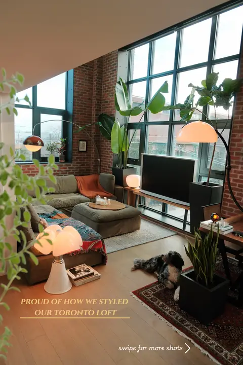 #interiordesign #apartmentdecor #homedecor #homeinspo #homebody • • mid-century modern | toronto interior | brick loft living | warm light | lived-in spaces | hard loft | tall ceilings | large windows | natural light | vintage furniture | statement lighting | plants | architectural details | open living | modern apartment | home atmosphere | interior styling | design focused | quiet spaces