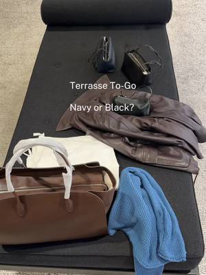 Only seeing blue—and now navy??   The shape, the skinny strap, proper 90s energy. I’ve been wearing my 90s bag nonstop, but this is the easier, throw-on-the-shoulder version.   Also… I don’t own any navy bags.  #therow #therowterrassetogo #therowterrasse 