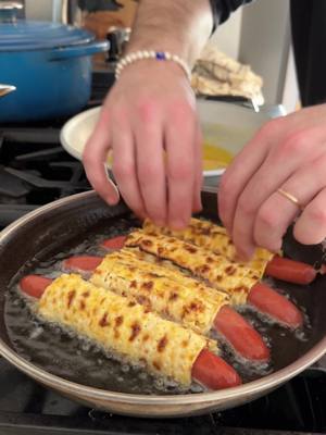 If you’re not frying your hot dogs like this, what are you doing?  This is one of my dad’s all-time Passover memories, and once you try it, you’ll get why we make it every single year. Growing up, he’d go to soccer games as a kid, and during the holiday, instead of buns, vendors would wrap hot dogs in matzah and fry them fresh to order. Crispy outside, juicy inside, zero crumbs left behind. Roll the hotdog in a matzah, dip in @Organic Valley free range eggs, and fry until golden crisp! Honestly… this isn’t just a holiday thing. This is an all-year snack. Full recipe “Matzah Pig In a Blanket” is on my website BenGingi.com YASSS!