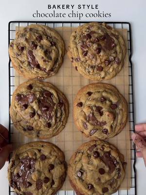 Bakery style chocolate chip cookies 🍪  Ingredients  3/4 cup (170g) unsalted butter, cold and cubed  3/4 cup (150g) dark brown sugar 1/3 cup (65g) granulated sugar 1 large egg + 1 egg yolk, room temp 2 tsp vanilla bean paste 2 cups (240g) all-purpose flour 1 tsp cornstarch 1 tsp espresso powder 1/2 tsp baking soda 1 tbsp milk powder  1/4 tsp baking powder 3/4 tsp salt 1 cup semi sweet chocolate chips 3/4 milk chocolate chips  Flaky sea salt for topping Method : In a bowl add all purpose flour, baking soda, baking powder, milk powder, espresso powder , corn starch and salt. Mix well to combine. In a stand mixer fitted with the paddle attachment, add the cold cubed butter, brown sugar, and granulated sugar. Mix on medium speed for about 2–3 minutes, until the mixture looks creamy.  Add the egg, egg yolk, and vanilla bean paste. Mix until fully combined, scraping down the sides of the bowl as needed. Gradually add the dry ingredients to the wet mixture. Mix on low speed just until combined—do not overmix. Stir in the semi-sweet and milk chocolate chips until evenly distributed.  Cover and refrigerate the dough for at least 2 hours ( or up to 24 hours for deeper flavor and thicker cookies). Preheat your oven to 350°F (175°C). Line a baking sheet with parchment paper. Scoop large portions of dough (about ounce each) and roll loosely into balls. For a bakery look, keep them tall rather than flattened. Bake for 15-16 minutes, or until Edges are set and lightly golden. Centers are still soft and slightly underbaked. Sprinkle flaky sea salt on top immediately after baking. Let cookies cool on the baking sheet for 5–10 minutes before transferring to a wire rack. #cookies #cookierecipes #chocolatechip #cookierecipe 