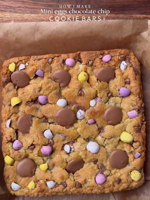 Mini eggs chocolate chip cookie bars 🪺  Ingredients: •115g cold chopped unsalted butter •80g caster sugar •80g light brown sugar •200g mini eggs chopped + chocolate chunks or chips(you can increase or reduce this according to your preference)  •238g plain flour  •½ tsp salt •1½ tsp baking powder •¼ tsp baking soda •1 whole egg + egg yolk  •½ tsp vanilla Instructions: •In a large mixing bowl, add the cold cubed butter and whisk until slightly creamy. Add the white sugar and light brown sugar, then whisk together until well combined and fluffy. •Add the egg+egg yolk, vanilla extract, mini eggs chopped and chocolate chips or chunks. Whisk until fully incorporated. •Add the flour, baking powder, baking soda, and salt. Gently mix until just combined, do not overmix. •Preheat oven to 175-180C (350°F). •Place the cookie dough balls onto a 8*8 Square tray  •Bake for 30-35 minutes or until the tops are lightly golden while the centres remain soft. **If the top turns golden but the inside is still very raw, cover it loosely with foil and continue baking** •Remove from the oven and let cool slightly. •Serve warm with ice cream🤤 #minieggs #cookie #chocolate #fyp #explorepage✨ 