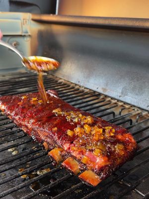 Wipe that drool off your chin and fire up the grill. 🔥 These Chipotle Pineapple–Glazed St. Louis Ribs bring the perfect mix of sweet heat and smoky flavor. Fair warning: make them once and your friends will expect them all summer. #TraegerGrills #Traeger #Traegerhood