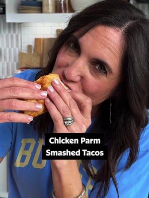 Another smashed taco, another win! 🥇😍 Keep this smashed chicken parm in the spirit of a taco with a Caprese salsa of tomatoes, mozzarella, basil, and olive oil. ❤️🌮 Keep reading or tap the link in the @allrecipes bio for full recipe details. ⬇️ Ingredients: 1 pound ground chicken 1/2 cup grated Parmesan cheese, divided 1 teaspoon minced garlic 1/4 teaspoon Italian seasoning 1 teaspoon kosher salt, divided 1/2 teaspoon freshly ground black pepper, divided 8 (4 inch) flour tortillas 2 large eggs, well beaten 1 cup seasoned panko bread crumbs 3 tablespoons olive oil, plus more as needed, divided 3/4 cup chopped fresh tomato 1/2 cup diced mozzarella cheese 2 tablespoons chopped fresh basil Directions: Combine ground chicken, 1/4 cup Parmesan cheese, garlic, Italian seasoning, 1/2 teaspoon salt, and 1/4 teaspoon pepper in a bowl. Mix until well combined. Spread mixture evenly and all the way to the edges of each tortilla. Place eggs in a shallow dish. Stir together breadcrumbs and remaining Parmesan cheese in second shallow dish. Dip each tortilla, meat side down, into egg mixture, allowing any excess to drip off and then press lightly into breadcrumb mixture to coat. Working in batches, in a large skillet, heat 2 tablespoons oil over medium-high heat until just shimmering. Place tortillas, breaded side down, in the skillet and allow to cook until golden brown and crisp, about 4 minutes. Flip and cook until lightly golden brown, about 1 more minute. Repeat with remaining tortillas and add more oil as needed. For Caprese salsa, stir tomatoes, mozzarella, basil, remaining salt and pepper, vinegar, and 1 tablespoon olive oil together in a bowl. Fold tacos in half and serve, topped with Caprese salsa. 🎥: Nicole @nicolesperfectbite #smashedtaco #chickenparmigana #EasyRecipes