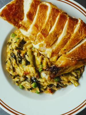 Chicken and Creamy Orzo - Another Day In Paradise This weekend’s newsletter uses my beloved chicken supreme - a skin on chicken breast with the wing bone still attached.  It’s served over a creamy but still fresh orzo, coated in all that fond from the chicken, with spring greens, asparagus and peas folded through. A good way to use up whatever’s left after Easter. It sits somewhere between the kind of spring cooking I’ve been wanting to do and something more comforting for these brighter, still chilly evenings. Recipe up Sunday - link in bio to sign up.