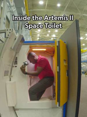 How does an astronaut go to the toilet in low gravity? Ahead of the Artemis II launch, NASA astronaut Christina Koch gave us a look inside the Orion crew capsule's toilet—complete with handholds, bright orange insulation, and surprisingly loud plumbing. Take a tour of the Orion spacecraft at the 🔗 in bio.