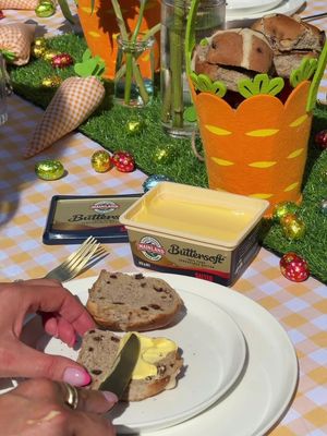 Easter at ours is less about the egg hunt… and more about the hot cross buns and butter 🧈💛 A cosy table, the boys buzzing, warm buns straight from the oven, and @mainlandnz ButterSoft at the centre of it all. That first spread on a hot bun - smooth, melty, and generous, just sets the tone for the whole morning. It’s the little traditions for me. Setting the table, sharing food, and everyone gathering together before the chocolate chaos begins. And if you ask our family… it’s never a race to the bun, it’s always a race to the butter