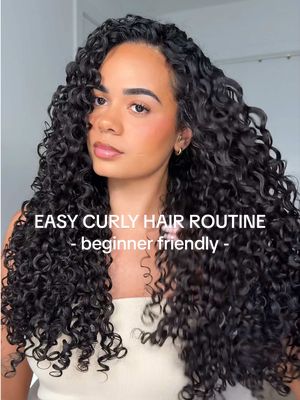 Easy curly hair routine for beginners ➰ More tips  - ﻿sleep with a satin bonnet to protect your curls - ﻿Start on CLEAN hair, always double shampoo to avoid weighed down curls - ﻿Avoid touching your curls when drying it can create frizz - Use separate detangling and styling brushes to avoid breakage Product & Tool breakdown  @Amazon spray bottle & clips @FHI HEAT detangling brush @BounceCurl volume styling brush @Kérastase gloss leave in  @The Doux Hair Care banana extreme gel @Gisou honey hair oil #curlyhairroutine #grwm #healthyhair #curlyhairtutorial #curlyhairroutine