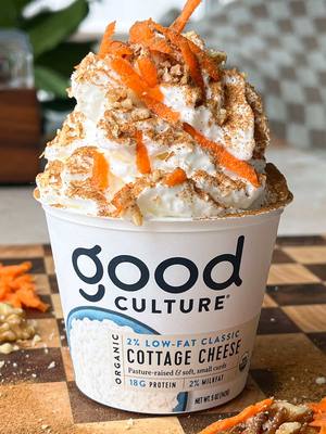 carrot cake-maxxing Carrot Cake Cottage Cheese Cup Ingredients Carrot Cake Base: • 1 Good Culture single serve cottage cheese cup • 1/4 cup plain greek yogurt  • 2 tbsp grated carrots  • 3 dates; soaked in hot water for 10 mins & drained  • 1 tbsp maple syrup • 1/8 tsp pumpkin pie spice  Toppings:  • whipped cream • pumpkin pie spice • crushed walnuts • shredded carrot (optional)  Method: 1. Add all base ingredients to the cup of an immersion blender & blend until smooth. 2. Transfer back to good culture cup and freeze for 25-30 minutes, stirring halfway through.  3. Top with whipped cream, pumpkin pie spice, crushed walnuts, + shredded carrot & enjoy! 