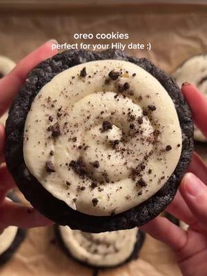 oreo cookies -> what to make to impress your @HilyApp date #hilycreator #hilyapp cookies: 1/2 cup (113g) unsalted butter, soft 1/2 cup (100g) light brown sugar 1/4 cup (50g) white sugar 1 egg + 1 egg yolk 1 tsp (4g) vanilla 1 1/4 cups (155g) ap flour 1/4 cup (25g) black cocoa powder 1/2 tsp (2g) baking powder 1/2 tsp (3g) baking soda 1/2 tsp (3g) salt 3/4 cup (120g) chopped oreos 1/2 cup (85g) white chocolate chips (optional) *cream together the butter and sugars until smooth and fluffy. add in the eggs and vanilla. in another bowl, whisk together the flour, cocoa powder, baking powder, baking soda, and salt. add the dry to the wet and then fold to combine. mix in the white chocolate chips and most of the oreos (saving some for later). scoop and set in the fridge for an hour. bake at 350 for 11-15 min depending on the size. let cool fully. frosting: 8 oz (226g) cream cheese, soft 4 tbsp (57g) unsalted butter, soft 1/2 tsp (2g) vanilla (paste if avail) pinch salt 3–4 cups (360–480g) powdered sugar 1–2 tbsp milk/cream if needed *cream together the cream cheese and butter until smooth. mix in the vanilla, salt, and powdered sugar. thin it out with milk or cream as needed. pipe on the fully cooled cookies and sprinkle on oreo crumbs :)