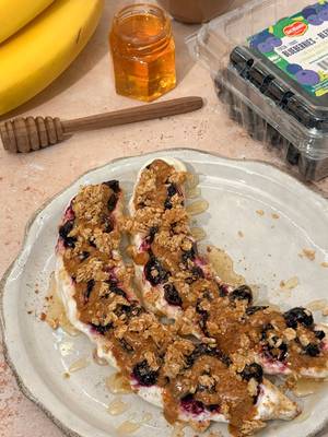 Indulge without the guilt 🍌🫐✨ Blueberry Banana Split: 👉 1 Fresh Del Monte banana 👉 1/2 cup Fresh Del Monte blueberries 👉 1/4 cup plain Greek yogurt  👉 1 tablespoon almond butter 👉 2 tablespoons granola 👉 1 teaspoon honey 👉 Dash of cinnamon #freshdelmonte #fruit #freshfruit #bananasplit #blueberrybananasplit 