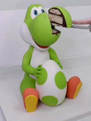 Would you have a slice of the Yoshi cake? 🍰  . . . . #mario #supermario #yoshi #cake #cakedecorating 