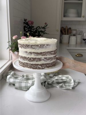 Less is more... and this naked cake proves it. 😉🎂✨ Soft layers, dreamy buttercream, and a finish that feels perfectly imperfect - just like life. With my birthday around the corner, I couldn't resist baking something simple and sweet to celebrate. Here's how I ice my Naked Cake! 👇 1. Make sure your cake is completely cool before starting. 2. Use a bit of frosting to anchor the first layer to your plate or stand! 3. Spread frosting evenly between layers using a spatula. 4. Pro tip: dip your spatula in hot water for a smooth spread! 5. Don't stress about perfection! That's it! It's rustic, but so elegant. One thing l've learned at 47? The best things in life don't need much dressing up. #FraicheLiving #FraicheAndSimple #NakedCake #VanillaCake #BirthdayCake #Buttercream #HomeBaker