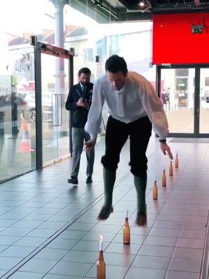 Most candles extinguished by jump heel clicks in one minute 🕯️ 55 by Tudur Phillips 🏴󠁧󠁢󠁷󠁬󠁳󠁿 Tudur set this record to celebrate St David's Day in 2020 with @S4C. Jumping heel clicks over candles are part of traditional Welsh clog dancing.