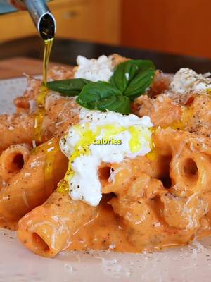My favorite protein pasta. Recipe link in bio! I’ve been seeing @Stealth Health Life make blended cottage-cheese sauces quite a bit over the years, and I’ve made a few myself, all incredible.  Definitely check his page for all things macro-friendly. Since I like to eat macro-friendly, “indulgent” meals on the weeknights, this kind of dish is the perfect way to trick yourself into thinking you’re eating something unhealthy.  I came up with this version to mimic rigatoni alla vodka with stracciatella, and I’m telling you, it will blow your mind.  You can eat this 3 times a day and only consume ~1800 calories, while eating 150g protein. (Obviously, you’d get sick of it pretty quick though). I recommend freezing the meal-prepped portions to eat whenever over the next few weeks/months, and just reheating in the microwave. It tastes just like the fresh version after freezing and reheating, but it also holds up great for about 4 days in the fridge.  Genuinely the best, most convincing, “indulgent”, meal prep-able, macro-friendly pasta dish I’ve ever tried. Note: these macros include an extra 20g cottage cheese & 5g parmigiano for garnish, but not the olive oil drizzle! 1 serving (makes 5): 586 Cal 51g Protein 62 Carbs 17 Fat #sauce #cottagecheese #healthy #mealprep 