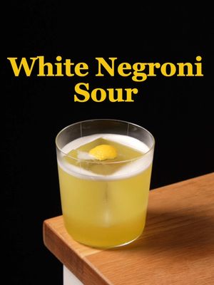 White Negroni Sour This one comes from Orlando Franklin McCray in 2022. It’s a great entry point if classic Negronis aren’t usually your thing. The lemon softens the bitterness and pulls everything into something closer to a crisp grapefruit cocktail. 1.25 oz navy strength gin 1.5 oz Cocchi Americano 0.75 oz Suze 0.75 oz fresh lemon juice 0.25 oz gum syrup A few dashes foaming bitters Shake hard with ice, then double strain over a big rock. #fyp #cocktails 