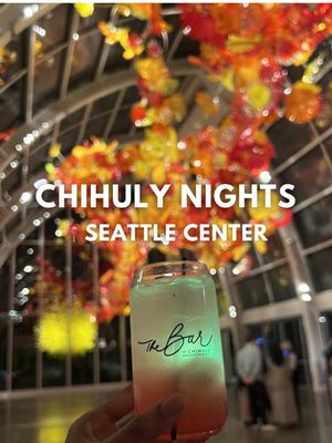 [media preview] Looking for an artsy, springtime date night idea? It’s right in Seattle Center at @Chihuly Garden and Glass. Chihuly Nights is a seasonal event where the gardens glow after sunset right under the Space Needle.  From April 17 - May 17 after 6 PM, you can attend Chihuly Nights. It’s a peaceful way to explore the exhibition in a whole new way. Seeing the glass at night is a different experience!  Tickets start around $35 and admission to Chihuly Nights is included in a regular museum ticket. You’ll also get access to food, drinks, live music, and other entertainment. If you want to put your artistic skills to the test, they offer a paint and sip class as well. Tickets sold separately for the class.  @What To See With Sarah G.  invited me as her guest for this preview event and we had a great time. Many thanks to the Chihuly team for hosting a nice event and musician David James for the live music! … … #seattlecenter #datenightideas #seattleevents #chihulygardenandglass #seattletiktok  Things to do in Seattle, tourist attractions in Seattle, Chihuly Garden and Glass