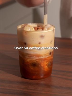 My 2026 favorites || Full recipes 👇🏽 Orange Latte Recipe 🍊: - peel an orange and cover the peels in a 1:1 ratio with sugar - let it sit in the fridge over night (add a little splash of water to dissolve all left sugar crystals if necessary) - brew a double shot of espresso over half - 1 oz of oleo saccharum (depending on how intense/ sweet you like it) - pour your espresso over ice & 4 oz/ 120 ml of your milk of choice  That’s it. Enjoy! 😁 Toasted Affogato 🍦☕️ Simple recipe: - 2 scoops vanilla ice cream - blow torch it - double shot of espresso  (- blow torch it even more) Sounds crazy but it’s delicious :D Banana Coffee Recipe 🍌🤎: - add to a blender: 150 ml/ 5 oz of barista oat milk, 1/2 banana, 1 tsp of honey, 1/3 tsp of cinnamon (a few dashes :D) - Blend until smooth, I’ve done 2 blend cycles - brew your double espresso while the mixer blends -add ice to your serving glass and pour in 150 ml/ 5 oz of water - add your espresso on top - top it with your banana cream (strain it if you want to get rid of any pieces) - garnish with cinnamon powder That’s it. Enjoy! 😁 #icedcoffee #icedlatte #affogato #coffeerecipe 