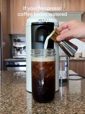 Stop brewing your Nespresso coffee directly over ice 👀 I know it feels like the easiest way to make iced coffee, but it’s actually the reason your drink ends up watered down and lacking flavor! When hot coffee hits ice right away, it melts it super quickly → which dilutes your coffee before you even get to enjoy it. Instead, try this: ☕️ Brew into a separate cup 🥛 Add your milk or creamer first 🧊 Use a second cup filled with LARGE ice cubes 🔁 Pour back and forth to chill quickly without over-melting the ice It makes SUCH a difference in flavor, and you’ll actually taste your coffee instead of watered-down ice 👏 Save this for your next iced coffee & follow for more easy at-home coffee tips! #nespressocoffee #icedcoffeeathome #athomecoffee #nespressovertuo 
