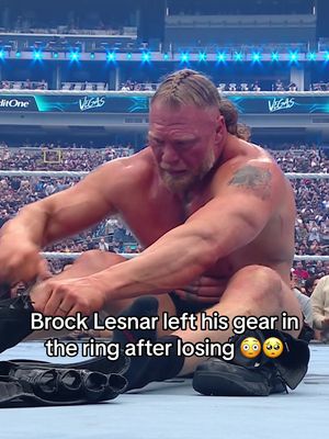 An emotional Brock Lesnar taking off his gloves and boots in the ring after losing to Oba Femi. 😮 #WrestleMania  #WWE #wweonnetflix #brocklesnar 