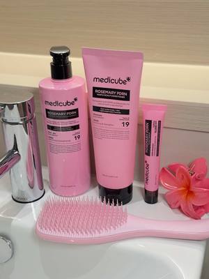 My fave glass hair trio!🎀 This @medicube global rosemary PDRN routine is skincare for your scalp!! And we all know healthy hair starts with a healthy scalp.  The shampoo and conditioner contain tiny PDRN capsules that burst to scale and detox the scalp, with a cooling effect while nourishing damaged hair and restoring balance. The serum strengthens the scalp to support hair growth with PDRN and rosemary and I love the roller applicator which makes it easy to relieve oily congested scalp! 've been loving this trio SO MUCH, especially because I get an itchy and flakey scalp! My hair has also felt much softer, shinier and stronger with less split ends and breakages.  You guys need to give this a go!  #medicube #hair #hairtok #hairgrowth #rosemary 