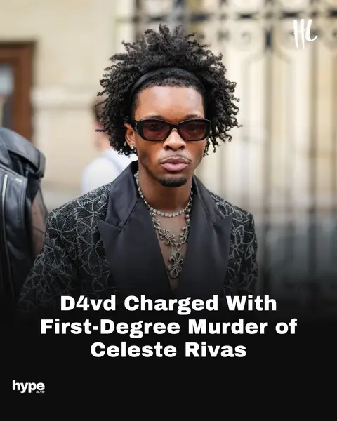 Singer d4vd is facing charges of first-degree murder in the death of Celeste Rivas, after the late teenager was found deceased in the trunk of his abandoned Tesla. Los Angeles County District Attorney Nathan Hochman said during a press conference today that d4vd will be charged with first-degree murder with potential eligibility for the death penalty.  (📸: Getty Images)