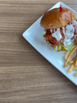They hired me… now I’m eating my way through the entire menu. Come along on the journey with me. First up, The Hot Chicken Sandwich!  #buffalochickensanwhich #Tiktokfoodie   #foodreview #Foodfinds #bigfoodportions