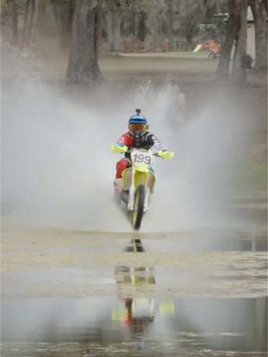 Travis Pastrana riding the RM Zilla across a pond 💦 @channel 199 