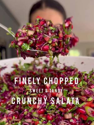 TWO YEARS since I posted this salata after it stood idle on my blog and YT channel for years 💚🧡❤️💜  Get this on your dinner tables tonight - who’s made this one already? Ok, what are you having for (lunch) or dinner tonight because this is THE perfect salad to have on repeat, now and always 💚🧡❤️💜 chop EVERYTHING as finely as possible (except for the pomegranate seeds and dressing ingredients obvs) and you will notice ALL the difference - dare I say, it’s even better the next day! #pleasemakeit INGREDIENTS 250g red cabbage, finely diced 1/2 English cucumber (deseeded) / 2 medium middle-eastern cucumbers (deseeded), finely diced  1 large red Romano pepper / kapya biber, finely diced 2 spring onions, finely sliced  50g fresh coriander, very finely chopped (stalks and leaves) 200g pomegranate seeds 3 tbsp extra virgin olive oil 2 tbsp freshly squeezed orange juice  1 tbsp white wine vinegar  2 tsp dried mint  1 tsp honey  2 tbsp pomegranate molasses  1/2 tsp sea salt flakes (or more to taste)  #melizcooks #salad #choppedsalad #finelychopped
