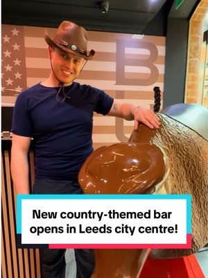 Say howdy to Leeds’ first RODEO bar - Buckle Up Cowgirl! 🤠 The team here reckon they’re the first ‘social experience bar’ in the UK - meaning the whole place is centred around getting people socialising 💃 Every single drink in this place comes with a challenge card (think doing the worm along the bar 😆🍺) to get people chatting… and doing some pretty bonkers stuff 🙈 Plus… the more challenges you do, the more drinks you win 🍻 There’s going to be plenty of country tunes, line-dancing and of course… mechanical bull riding 🐂 @Buckle Up Cowgirl opens tomorrow (Friday 24th April 2026).  #leeds #leedscitycentre #leedsbars #countrybar #countrymusic 