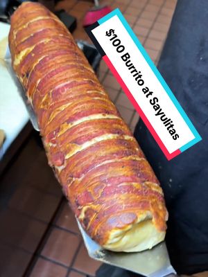 Sure, it looks like stunt food, but @Sayulitas Mexican Food Mexican meets Filipino cuisine is defreakinlicious and this wild burrito featuring lumpia and a whole lot more is a great example of that!!  #burrito #lasvegas #vegas #viralfood #mexicanfood