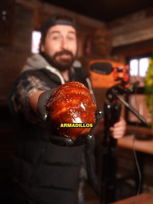 Armadillo Eggs | Recipe 👇  This is one of my favorite recipes for the smoker. It’s basically a leveled up jalapeño popper. Easy to make and while they smoke you can play @Cafe Casino | Foodie Inspo  🐷 Recipe: 🔸1lb of ground pork 🔸4-5 Jalapeños 🔸Bacon (thin cut) 🔸8oz cream cheese 🔸 1 1/2 cups shredded colby jack cheese 🔸 BBQ Seasoning 🔸 BBQ sauce for glazing 🔹Set your smoker to 250°F 🔹Core your jalapeños 🔹Mix cream cheese, Colby jack, and your seasoning. Stuff your jalapeños. 🔹Season your ground pork and wrap your jalapeño’s with it. 🔹Wrap with bacon 🔹Smoke for about 2 hours or until they hit 165°F 🔹Glaze with bbq sauce when they are 10 minutes from being done #EasyRecipe #bbq 