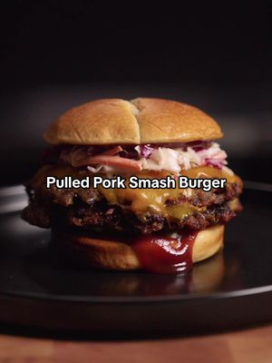 Pulled Pork Smash Burger… We all love low and slow BBQ… but what if you could combine it with a high heat crust? These pulled pork smash burgers do exactly that. You get tender, smoky, pull apart pork with a crispy, caramelized crust. Start with a whole pork shoulder seasoned with McCormick @Grill Mates Bourbon & Oak Seasoning, for the perfect balance of smokey sweetness that works especially well on pork. Smoke until tender, then pull and smash into patties for that perfect crust. Pile it high with coleslaw and toppings… this might be the best way to eat pulled pork! #ad