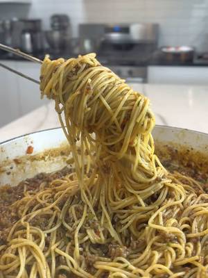 This ain’t the spaghetti you make when you’re trying to be cute. This is the spaghetti you make when you want silence at the table. 🍝🔥 Dirty Spaghetti Ingredients 1 pound thin spaghetti 1 pound ground beef 1 pound hot Italian sausage 1 small yellow onion, diced 1 green bell pepper, diced 1 red bell pepper, diced 6 cloves garlic, minced 4 tablespoons all-purpose flour 2 tablespoons tomato paste 1 tablespoon Worcestershire sauce 4 cups beef stock, divided 1 packet Lipton Beefy Onion Soup Mix 2 teaspoons Creole seasoning 2 teaspoons Italian seasoning 1 teaspoon Nature’s Seasoning 3 scallions, diced Salt and pepper, to taste if needed Instructions Cook the thin spaghetti in salted water until al dente. Drain and set aside. In a large skillet over medium-high heat, brown the ground beef and hot Italian sausage, breaking it apart as it cooks. Do not drain the grease. Sprinkle in the flour and mix until the meat is coated. Stir in the tomato paste until fully incorporated. Add the diced onion, green bell pepper, red bell pepper, Worcestershire sauce, and minced garlic. Cook for a few minutes until the vegetables start to soften. Pour in the beef stock, then stir in the Lipton Beefy Onion Soup Mix, Creole seasoning, Italian seasoning, and Nature’s Seasoning. Simmer until the sauce becomes thick, rich, and gravy-like. Taste and adjust with salt and pepper if needed. Add the cooked spaghetti directly into the skillet and toss until fully coated. Fold in the diced scallions at the end and serve hot. #pasta #spaghetti #recipes #food #foodtiktok 