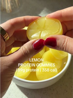 Lemon Protein Gummies with 89 grams of protein and only 358 calories?!??? Say no more 🍋 If you’re looking for a fun way to hit your protein goals, these Lemon Protein Gummies are about to be your new obsession. Follow me & comment “recipe” and I’ll send you the full recipe directions & macros! https://basicswithbails.com/diet/high-protein/lemon-protein-gummies/ INGREDIENTS - 2 scoops Lemon Italian Ice Clear Protein from @1UpNutrition (use code BAILS at checkout to save up to 40% on all products & free shipping over $150 for Canadians!!) 14 oz filtered water 5 tbsp gelatin Optional - 1 tbsp malic acid to make them sour #proteingummies #proteincandy #highproteincandy #highproteindessert #proteindessert