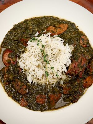 Gumbo z'herbes is a Louisiana Creole dish rooted in centuries of cultural layering including African traditions of slow simmered leafy greens, French influence, Caribbean and Indigenous foodways, Catholic Lenten cooking traditions, and the seasonal rhythm of South Louisiana kitchens. It became closely associated with the Thursday before Easter in New Orleans households, when greens were abundant and cooks used whatever tender leaves were available.  The tradition of using seven, nine, or more greens comes from older folk symbolism tied to luck, abundance, and blessing for the year ahead. Chef Leah Chase helped preserve and elevate gumbo z'herbes as a Creole staple at Dooky Chase's Restaurant, making it more widely recognized while keeping it grounded in tradition. Have you ever heard of this dish, and if not, would you give this a try? This recipe can be found on my website in my bio. #risascuisine #gumbozherbes #creole #neworleans 