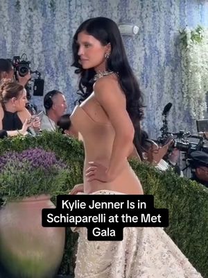 Make way for @Kylie Jenner in @schiaparelli! The reality star and entrepreneur arrives to the #MetGala—with a bit of help.