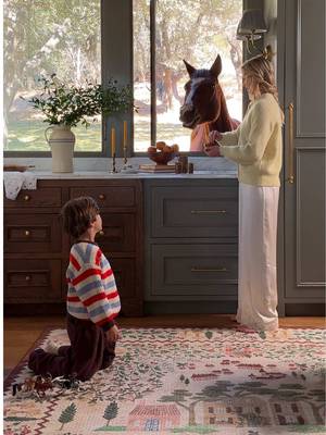 Life imitates art. Or maybe it’s the other way around. The new washable Orchard rug mirrors it all: horses underfoot, horses just outside, and a space made for moments like this. #RiflePaperCoxLoloi @Rifle Paper Co.  Rug: Orchard ORH-02 Antique Ivory / Multi
