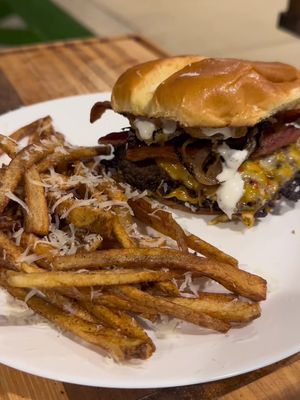 Fried pickle smashburgers and truffle fries on the back patio #outdoorcooking #blackstone #lifestylevlog #backyardvibes #lifestylevlog 