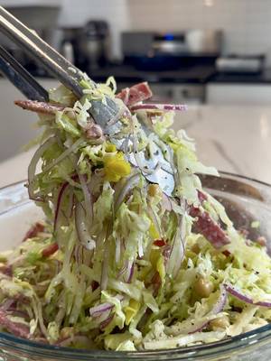 Somebody said this was the salad you eat when you’re trying to get your life together… so here we are 😂😂🥗 Viral Chopped La Scala Salad 1.5 heads iceberg lettuce, thinly sliced 1 cup sliced salami 1 can chickpeas, drained and rinsed 1 cup mozzarella cheese 1/4 cup pepperoncinis, chopped 1 small to medium red onion, super thinly sliced Dressing 1/4 cup red wine vinegar 1/3 cup extra virgin olive oil 2 tsp Dijon mustard 1 garlic clove, finely grated 1 tsp dried oregano 1 to 2 Tbsp pepperoncini juice Salt and black pepper to taste 1/4 cup finely grated Parmesan Instructions Add all salad ingredients to a large bowl. Whisk the dressing together until smooth, then pour it over the salad. Toss everything really well until fully coated. Let it sit for 5 to 10 minutes, toss again, then serve. #salad #healthyeating #healthy #food #foodtiktok 