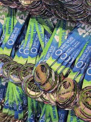 Volunteers have been busy unboxing some bling this week ✨ Counting down the days until you all cross the finish line! 🩵💚 #calgarymarathon #runcalgary #morethanrun