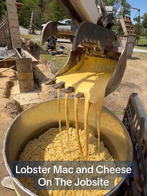 We built a custom oven out of boulders and baked a massive pan of lobster Mac and cheese on the jobsite #construction #heavyequipment #cooking #DIY #contractor