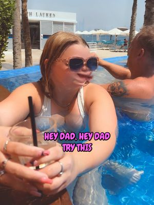 Daughter pranks her dad on holiday in the pool