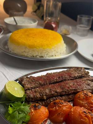 RECIPE Pan-Kabab  Recept på svenska? Kommentera så skickar jag 🙏🏽 Ingredients (2 servings) For the kebab: 500 g ground meat (beef, lamb, or mix) 1 large yellow onion (grated and drained) 1 tsp ground black pepper 1 tsp salt A few drops of Saffron Instructions Prepare the meat mixture: Finely grate the onion and squeeze out the excess liquid. In a bowl, mix ground meat, grated onion, spices and olive oil. Knead well until the mixture becomes smooth and cohesive. Cook the kebab: Put some olive oil in a pan sheet. Press the meat mixture evenly into the pan, about 1.5 cm thick. Add tomatoes to the pan. Score into long rectangular strips directly in the pan using a spatula or knife to create kebab-like shapes. Cook in the oven at 250 degrees C for the first 5 min and then 220 degrees for another 20 min.  Serving suggestions Serve with: Persian rice, comment if you want the recipe for Persian rice with Tahdigz Fresh parsley Sour torshi (pickled vegetables) Fresh onion and yogurt  #persian #tahdig #iran #fyp #recipes 