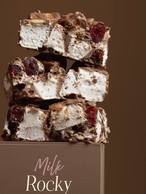 This winter, discover Haigh's Milk Rocky Road. A generous affair of fluffy vanilla marshmallow, plump cherries and golden sultanas, with just enough crunch from slivered almonds. All enveloped in our signature creamy milk chocolate. It is soft, sweet, and wonderfully nostalgic - one piece is a pleasure. A second, practically inevitable.