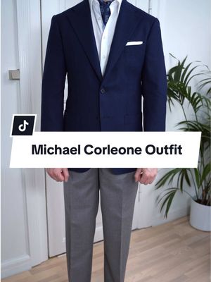 How to dress like Michael Corleone in The Godfather 🎬 This is one of my all-time favourite films, and this look stood out immediately when I saw it again. I wanted to recreate that quiet, controlled elegance Michael carries in these scenes. I went with grey high-waisted flannel trousers, black classic Oxford shoes, and a white point-collar shirt. Instead of a traditional cravat, I used a blue scarf tied in its place, paired with a navy single-breasted jacket to keep the silhouette sharp and understated. Finished with a vintage gold Omega watch and a gold signet ring for a subtle touch of character. #menswear #mensstyle #mensfashion #thegodfather #michaelcorleone 