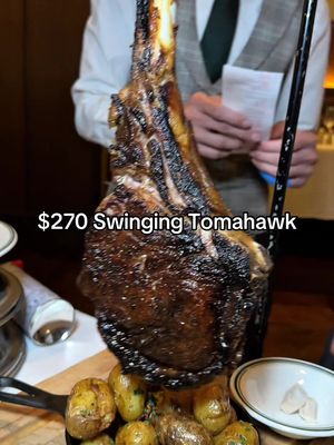 The Swinging Tomahawk Ribeye is 44oz of beef bliss with a great tableside presentation for $270 #steak 