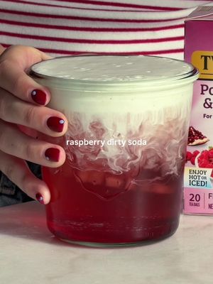 Dirty soda summer starts now 💗🥤✨  Fruity, creamy, carbonated, and made even better with @Twinings USA Pomegranate & Raspberry tea. #ad Recipe: Add crushed ice and 1 tbsp raspberry syrup to a glass. Brew 1 bag of @twiningsusa Pomegranate & Raspberry tea in 6 oz of boiling water. Steep for 5 minutes and let cool before adding to the glass. Add ~4 oz of club soda. In a separate container, whisk together 3 tbsp coconut cream and 1 tbsp milk of your choice. Add to the drink. Stir and enjoy! Check out this vibrant herbal blend bursting with juicy pomegranate and raspberry flavors for a bold, fruity aroma and naturally sweet sip. ✨ Find this flavor and more at www.twiningsusa.com 🌸 #twiningsusapartner #pomegranateandraspberry #herbaltea #dirtysoda