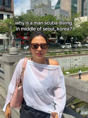 koreans can u explain to me why someone is swimming inna full wet suit in the seoul river……. #scuba 
