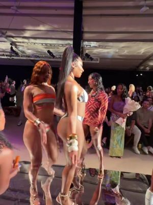 now this is some real hot girl shit! #MiamiSwimWeek model and designer #MeganTheeStallion has the sweetest reaction to getting her flowers on the runway at her the #HotGirlSummer show. 💐👙 🎞️ @kevincuonghuynh 